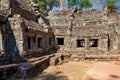 The ancient ruins of a historic Khmer temple in the temple complex of Angkor Wat in Cambodia. Travel Cambodia concept. Royalty Free Stock Photo