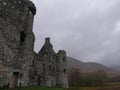 Ancient ruins of the Kilchurn Castle in a gloomy weather Royalty Free Stock Photo