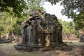 Ancient ruins of Krol Ko temple in Angkor Wat complex, Cambodia. Demolished hindu temple in forest.