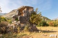 Large Lycian sarcophagus with highly decorated ceiling inside. Royalty Free Stock Photo