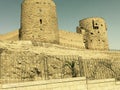 The ancient ruins of an old fortress. The ruins of an ancient fortress with two surviving high watchtowers.