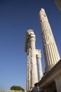 Ancient Ruins of Pergamon Acropolis. Ancient city column ruins with the blue sky in the background. Close-up. Royalty Free Stock Photo