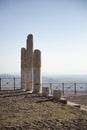 Ancient Ruins of Pergamon Acropolis. Ancient city column ruins with the cityscape in the background. Royalty Free Stock Photo