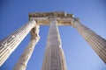 Ancient Ruins of Pergamon Acropolis. Ancient city column ruins with the blue sky in the background. Close-up. Royalty Free Stock Photo