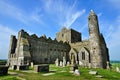 Ancient ruins of the Rock of Cashel with rouond tower and old burial grounds