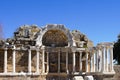 Ancient Ruins of a Stunning Historical Structure Showcasing Arched Architecture and Classical Columns Against a Clear Royalty Free Stock Photo