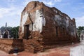 Ancient ruins ubosot ordination hall and antique old ruin stupa chedi for thai people visit respect praying blessing at Wat Yai