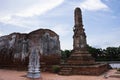 Ancient ruins ubosot ordination hall and antique old ruin stupa chedi for thai people visit respect praying blessing at Wat Yai