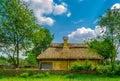 Ancient rural cottage with a straw roof