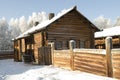 Ancient Russian log hut in the winter Royalty Free Stock Photo