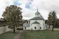 Ancient Russian church and a fragment of the fortress wall Royalty Free Stock Photo