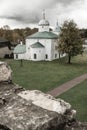 Ancient Russian church and a fragment of the fortress wall Royalty Free Stock Photo