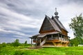 Ancient Russian wooden church under stormy sky Royalty Free Stock Photo