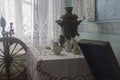 Ancient samovar on a table for tea drinking