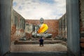 The Ancient sandstone Buddha in Ayutthaya Historical Park , Royalty Free Stock Photo