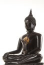 Ancient scratch black buddha isolated