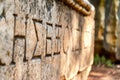 Ancient script hieroglyph carved on stone block in Athens, Greece Royalty Free Stock Photo