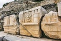 Ancient sculpted marble ruins at the Archaeological Site of Eleusis in Attica, Greece Royalty Free Stock Photo