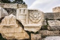 Ancient sculpted marble ruins at the Archaeological Site of Eleusis in Attica, Greece