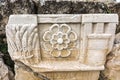 Ancient sculpted marble ruins at the Archaeological Site of Eleusis in Attica, Greece