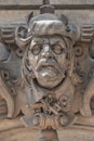 Ancient sculpture of scary, fearful and heavy armed gatekeeper, medieval warrior with weapon in historical downtown of Dresden,