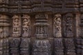 Ancient sculpture and stone carvings on the walls of the ancient 13th century sun temple at Konark, Odisha, India.