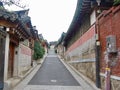 Ancient Seoul, South Korea streets with historical buildings and empty street up a hill. Typical Asian style roads/streets Royalty Free Stock Photo