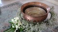 Ancient Small baptismal font in copper decorated with flowers du