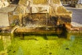 Ancient source of fresh and transparent water made of stone in an old village in Spain. Royalty Free Stock Photo