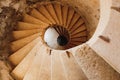 An ancient spiral stone staircase in Fort Mamula in Montenegro