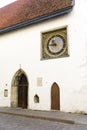 Ancient clock on a church wall in Tallinn, Estonia Royalty Free Stock Photo