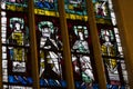 Ancient stained glass windows on a religious theme in the Cathedral of the Blessed Virgin Mary in Munich Germany.