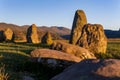 An ancient standing stone circle on high ground surrounded by mountains Royalty Free Stock Photo