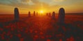 Ancient standing stones arrayed in a field of red wildflowers during a vibrant sunset Royalty Free Stock Photo