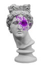 Ancient statue of Apollo God of Sun head isolated on a white background with paint splash. Plaster sculpture of man face Royalty Free Stock Photo