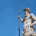 Ancient statue of god of seas and oceans Neptune Poseidon.  Copy space for text or design Royalty Free Stock Photo