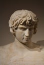 Ancient Statue Head of a beautiful young man Royalty Free Stock Photo
