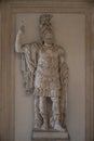 Ancient statue of a heavily armed Roman man warrior from Roman Empire Era, Rome, Italy, details