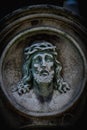 An ancient statue of Jesus Christ crown of thorns. Vertical image Royalty Free Stock Photo