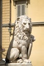Ancient statue of a lion in the medieval city of Florence