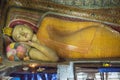 Ancient statue of lying buddha at buddhist temple Royalty Free Stock Photo