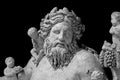 Ancient statue of Nile river god. Head and shoulders detail of the ancient art sculpture bearded man isolated on Royalty Free Stock Photo