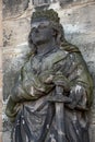 Ancient statue portrait of a princess knight as gatekeeper in Magdeburg Cathedral as Magdeburg, Germany, closeup, details