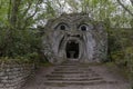 The ancient statue representing the ogre, in the park of monsters in Bomarzo, Italy