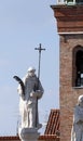 Ancient statue of Saint Vincenzo above the namesake church in th