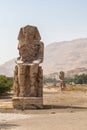 Ancient statues of Colossi on the west bank of the Nile, Luxor, Egypt Royalty Free Stock Photo