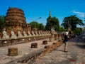 Ancient statues of meditating buddha sitting, at Wat Yai Chaimongkol in Ayutthaya, Thailand, Feb 2019 Royalty Free Stock Photo