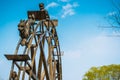 Ancient steel watermill wheel, Chinese style with blue sky background