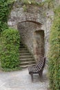 Ancient stiarwell and wooden bench