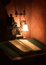 Ancient still life. Book under the lamp Royalty Free Stock Photo